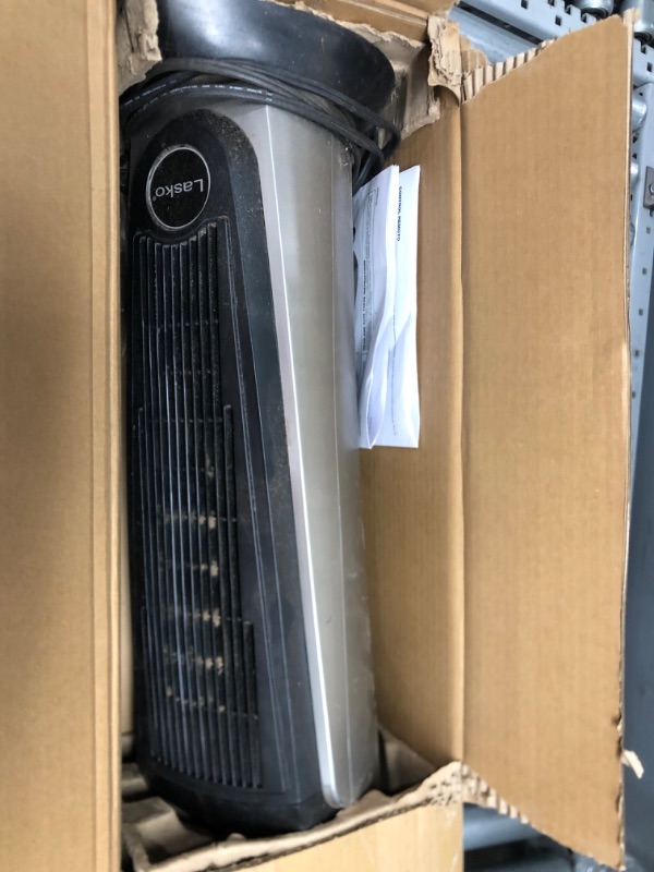 Photo 2 of ****PARTS ONLY*** Lasko 751320 Ceramic Tower Space Heater with Remote Control - Features Built-in Timer and Oscillation