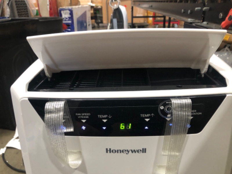 Photo 2 of Honeywell Classic Portable Air Conditioner with Dehumidifier & Fan, Cools Rooms Up to 700 Sq. Ft. with Drain Pan & Insulation Tape, MN4CFSWW9 (White), 29.400
