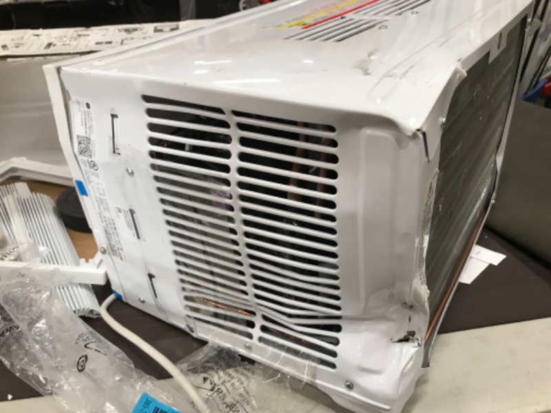 Photo 4 of **Parts Only Non Functional***HEAVY DAMAGE**TURNS ON THEN SHUTS OFF** GE Window Air Conditioner 8000 BTU, Wi-Fi Enabled, Energy-Efficient Cooling for Medium Rooms, 8K BTU Window AC Unit with Easy Install Kit, Control Using Remote or Smartphone App
