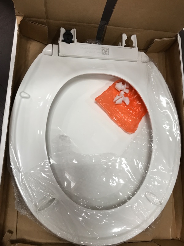 Photo 2 of **DAMAGE** KOHLER Brevia Round Closed Front Toilet Seat with Quick-Release Hinges in White