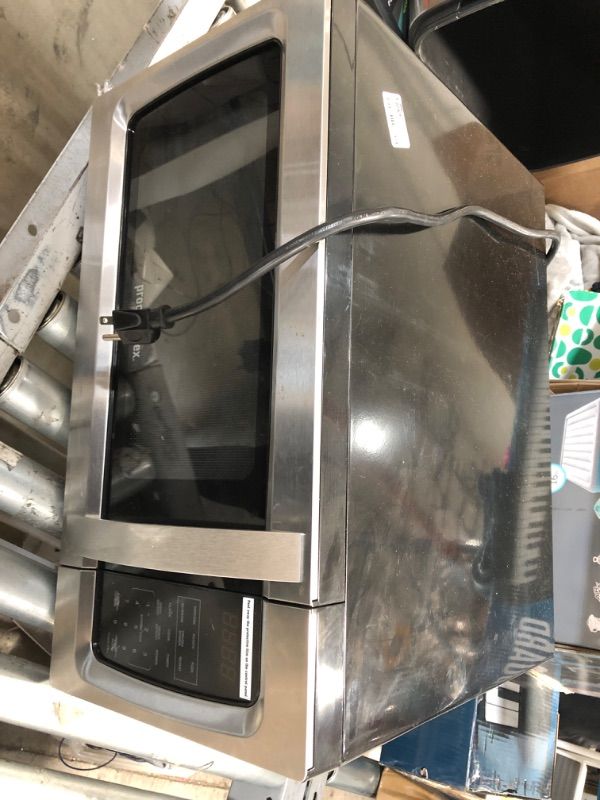 Photo 5 of  1.3 cu ft 1100 Watt Microwave Oven - Stainless Steel 