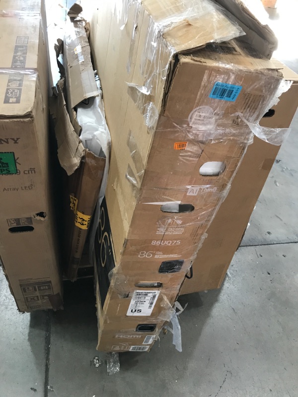 Photo 1 of MIXED PALLET OF DAMAGED TVS AND MONITORS**5 UNITS**NO REFUNDS**