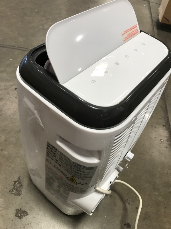 Photo 7 of **ODOR COMING FROM UNIT**TESTED** BLACK+DECKER 8,000 BTU Portable Air Conditioner with Remote Control, White
