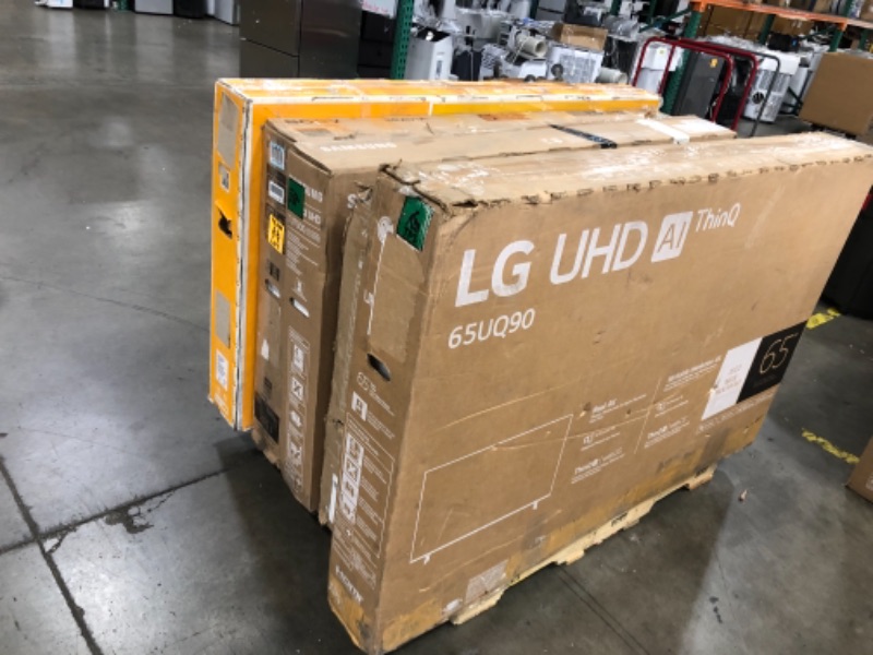 Photo 1 of PALLET OF ASSORTED DAMAGED TVS NO RETURNS NONREFUNDABLE
