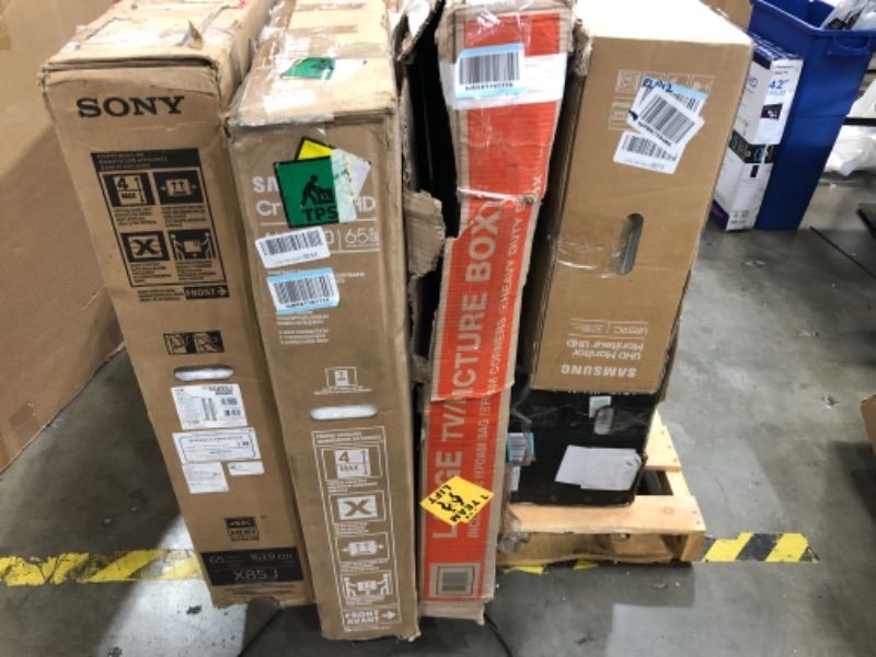 Photo 2 of PALLET OF ASSORTED DAMAGED TVS NO RETURNS NONREFUNDABLE
