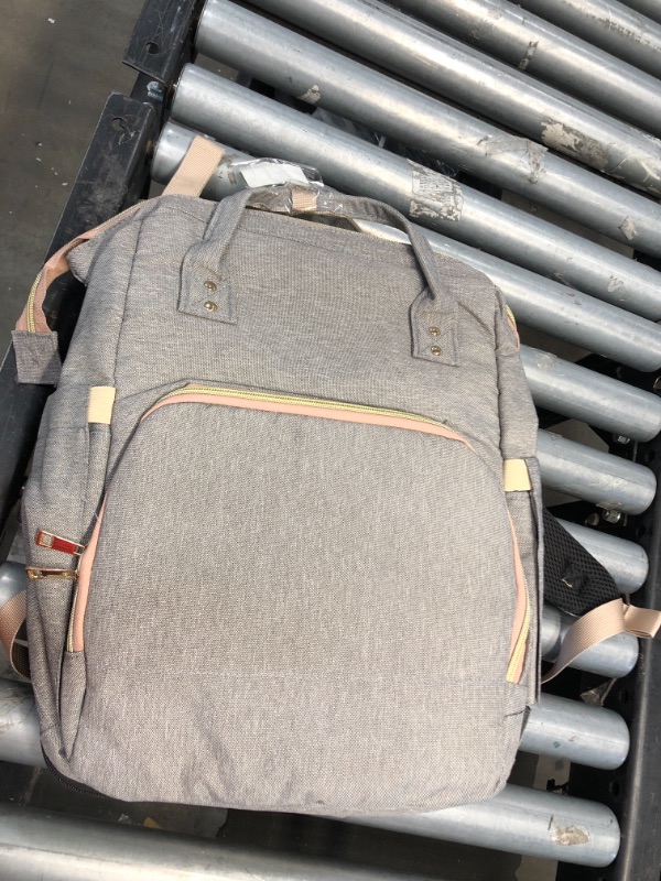 Photo 1 of BACKPACK SMALL TAN AND PINK COLORED