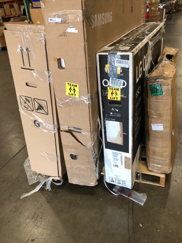 Photo 1 of MIXED PALLET OF DAMAGED TVS AND MONITORS**NO REUNFDS**MIXED SIZES 5 UNITS**