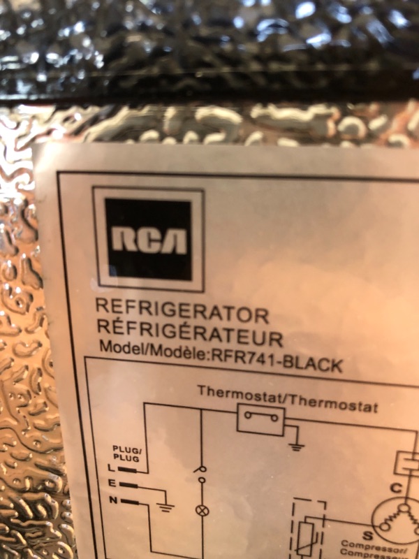 Photo 7 of PARTS ONLY ONLY FREEZER GETS COLD 
RCA RFR741-BLACK Apartment Size-Top Freezer-2 Door Fridge-Adjustable Thermostat Control-Black-7.5 Cubic Feet
