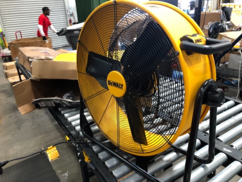 Photo 2 of **DOES NOT POWER ON**DEWALT Drum Fan High-Velocity Industrial, Drum, Floor, Barn, Warehouse Fan, Heavy Duty Air Mover with Adjustable Tilt & Large Wheel, 24", Yellow DXF2490
