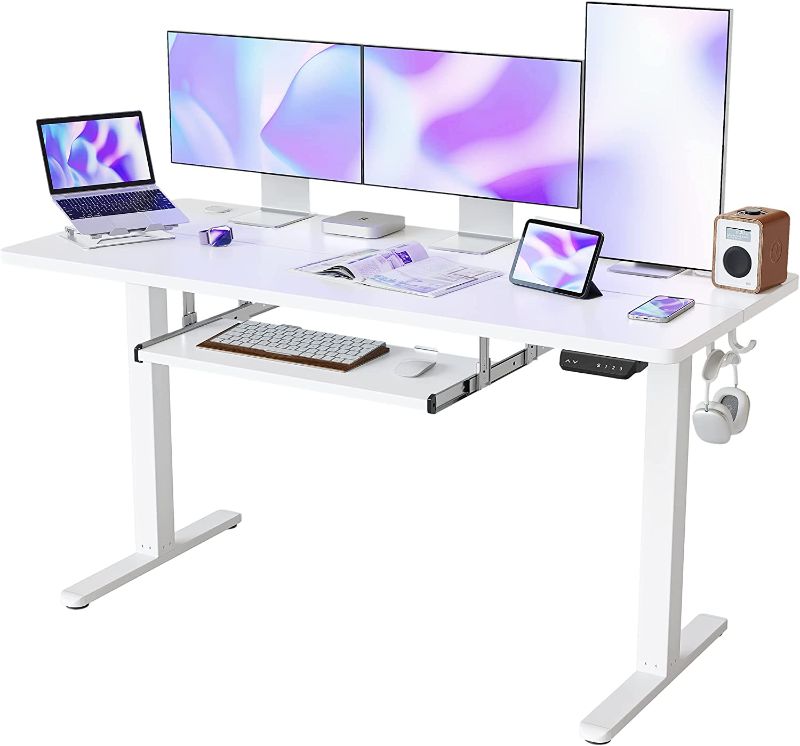 Photo 1 of FEZIBO 63-Inch Large Height Adjustable Electric Standing Desk with Keyboard Tray, 63 x 24 Inches Sit Stand up Desk with Splice Board, White Frame/White Top
