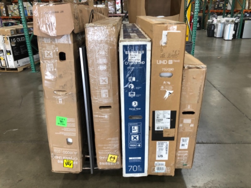 Photo 2 of PALLET OF ASSORTED DAMAGED TVS NO RETURNS NONREFUNDABLE
