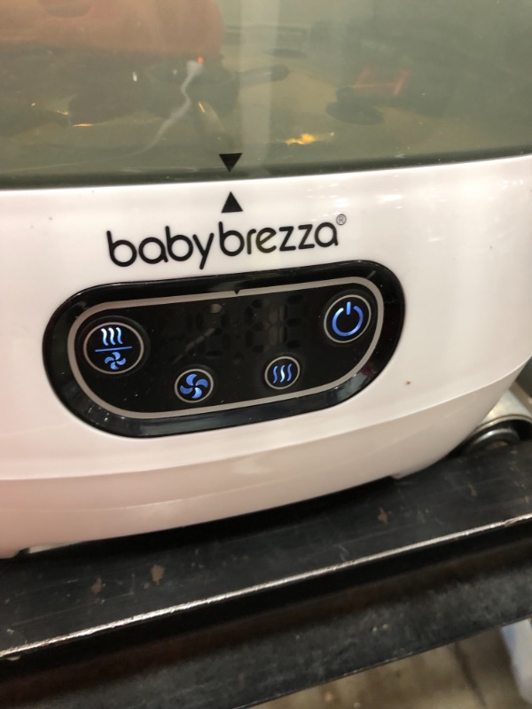 Photo 2 of Baby Brezza Baby Bottle Sterilizer and Dryer Advanced – Electric Steam Sterilization Machine – Universal Sterilizing for All Bottles: Plastic + Glass + Pacifiers + Breast Pump Parts - HEPA Filtration
