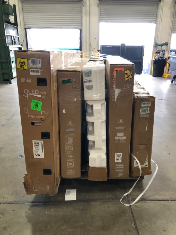 Photo 1 of PALLET OF ASSORTED DAMAGED TVS NO RETURNS NONREFUNDABLE