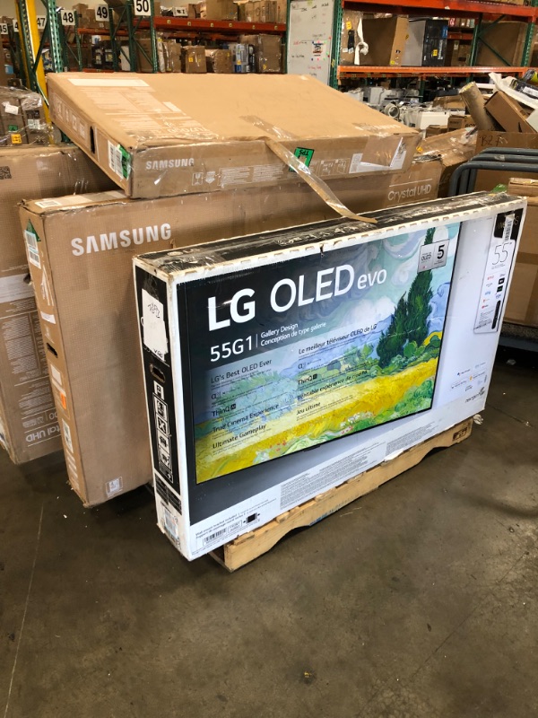 Photo 3 of PALLET OF 6 DAMAGED TVS NO REFUNDS OR RETURNS 