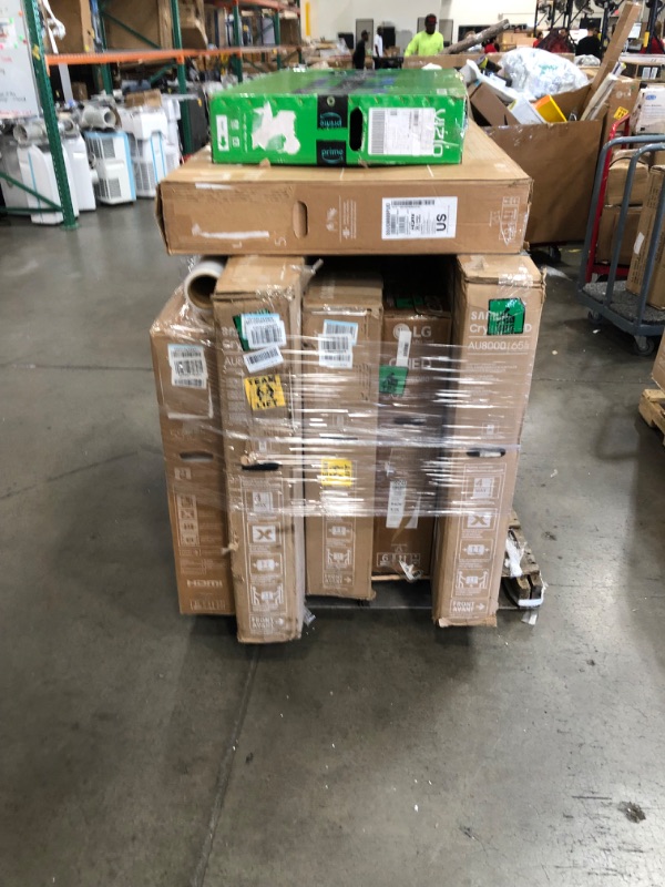 Photo 1 of PALLET OF  7 DAMAGED TVS NO REFUNDS OR RETURNS 