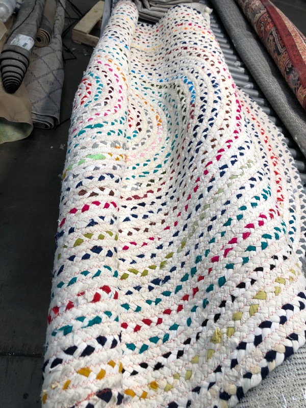 Photo 1 of 6'2" round dots rug (Unknown brand/model)