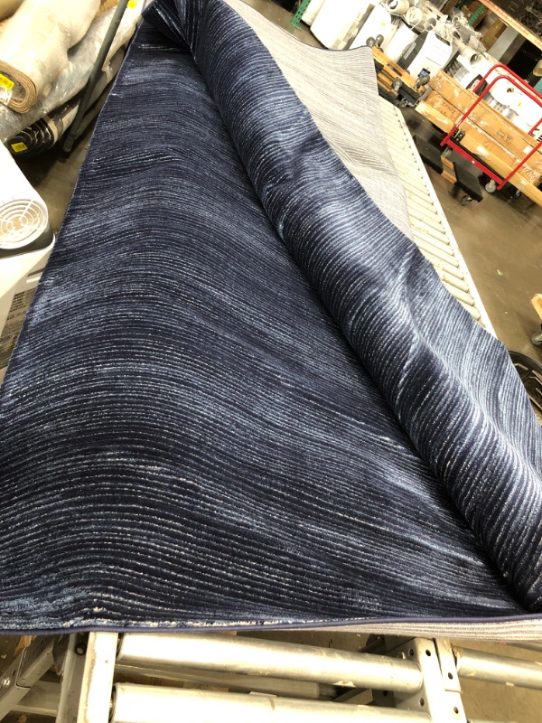 Photo 1 of 9'10" x 7'10" steel blue area rug (Estimated size)