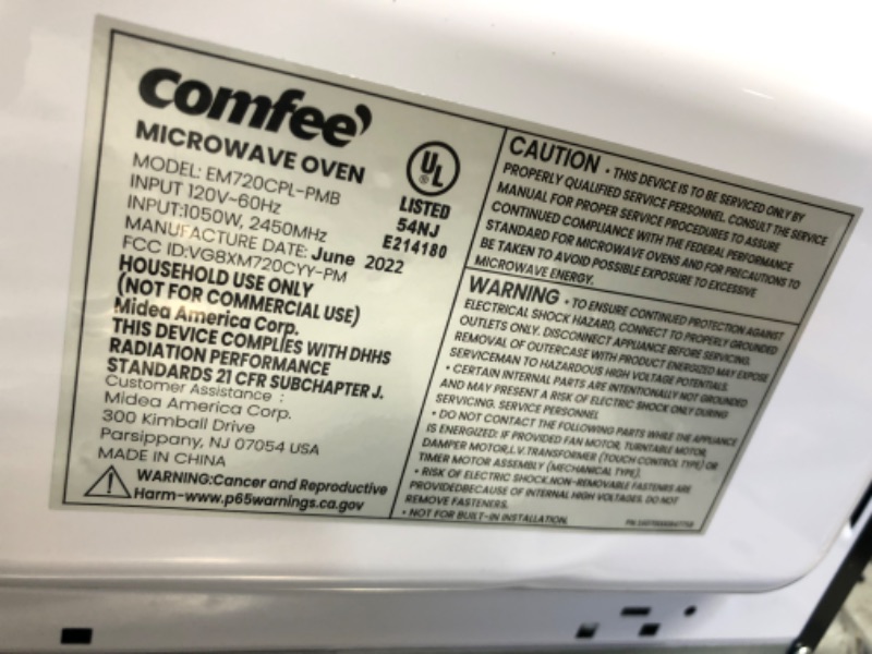 Photo 5 of COMFEE' EM720CPL-PMB Countertop Microwave Oven with Sound On/Off, ECO Mode and Easy One-Touch Buttons, 0.7cu.ft, 700W, Black