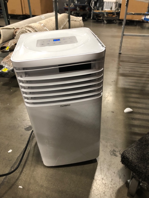 Photo 4 of (DAMAGE)TURBRO Greenland 10,000 BTU Portable Air Conditioner, Dehumidifier and Fan, 3-in-1 Floor AC Unit for Rooms up to 400 Sq Ft, Sleep Mode, Timer, Remote Included (6,000 BTU SACC)
**BUSTED ON THE SIDE, BROKEN WHEEL**