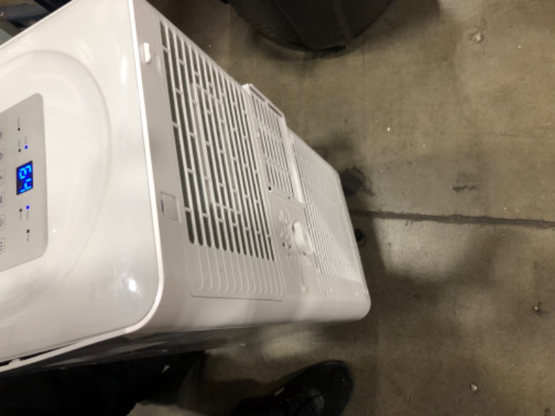 Photo 5 of (DAMAGE)TURBRO Greenland 10,000 BTU Portable Air Conditioner, Dehumidifier and Fan, 3-in-1 Floor AC Unit for Rooms up to 400 Sq Ft, Sleep Mode, Timer, Remote Included (6,000 BTU SACC)
**BUSTED ON THE SIDE, BROKEN WHEEL**