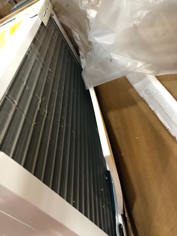 Photo 8 of (DAMAGED)Energy Star 18,000 BTU 230-Volt Window Air Conditioner with Electronic Controls and Remote
**BUTTON PAD IS DAMAGED, STILL FUNCTIONAL**