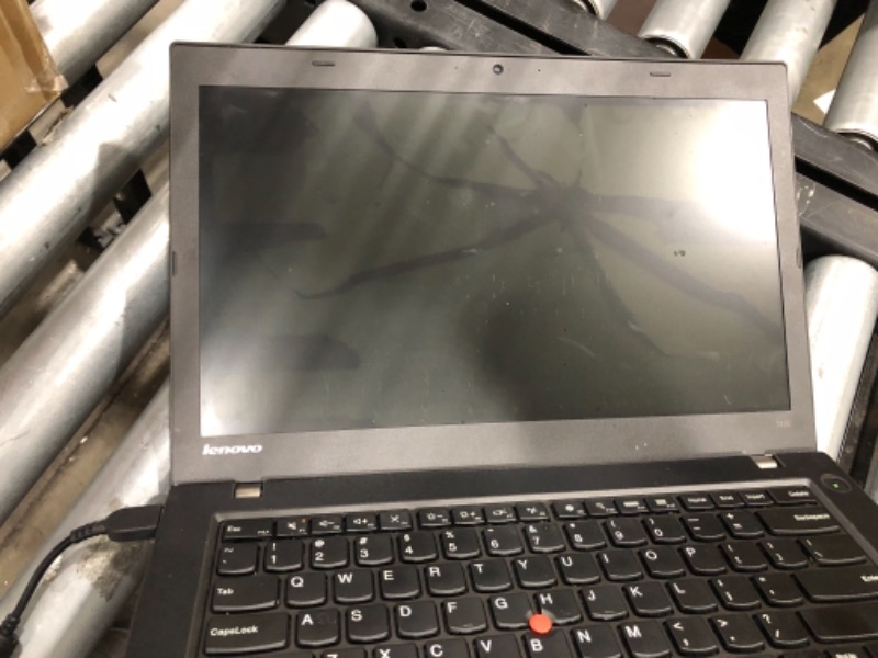 Photo 2 of PARTS ONLY 
DAMAGED SCREEN UNABLE TO TEST 
Lenovo ThinkPad T450 14in Laptop 