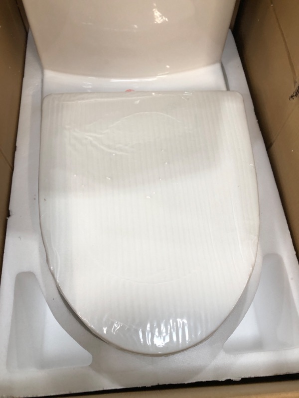 Photo 4 of **LID MISSING**Swiss Madison St. Tropez Glossy White Dual Flush Elongated Comfort Height Toilet 12-in Rough-In Size
