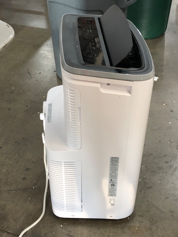 Photo 4 of USED: Frigidaire FHPW142AC1 Portable Room Air Conditioner, 14,000 BTU with Multi-Speed Fan, Dehumidifier Mode, Built-in Air Ionizer, Easy-to-Clean Washable Filter, Wi-Fi Connected, in White 16.54"D x 19.4"W x 31.34"H

