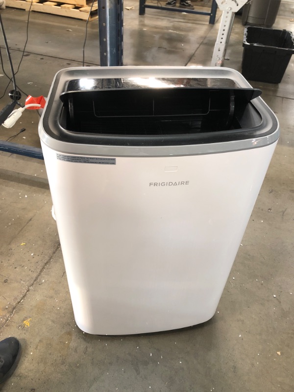 Photo 2 of USED: Frigidaire FHPW142AC1 Portable Room Air Conditioner, 14,000 BTU with Multi-Speed Fan, Dehumidifier Mode, Built-in Air Ionizer, Easy-to-Clean Washable Filter, Wi-Fi Connected, in White 16.54"D x 19.4"W x 31.34"H

