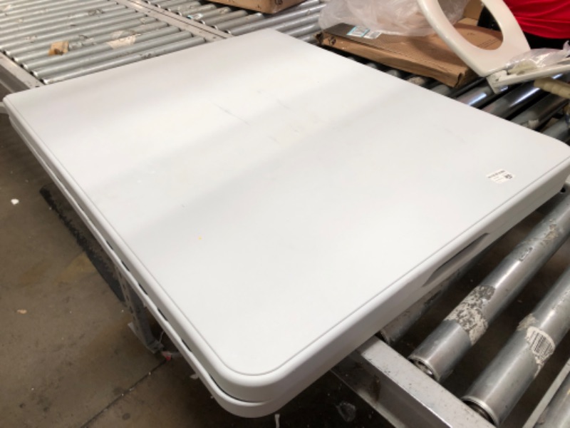 Photo 1 of USED: 6' Folding Banquet Table Off-White - Plastic Dev Group 72 Inches (L), 29 Inches (H) x 29 Inches (W)

