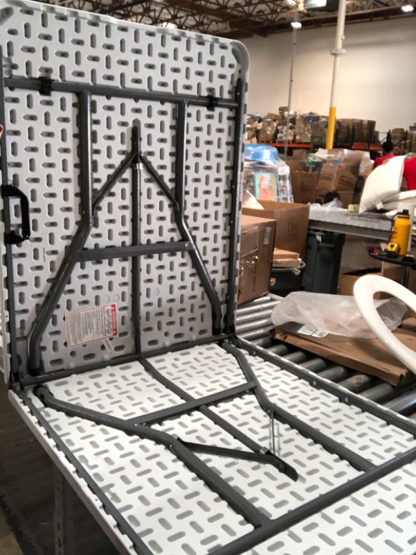Photo 1 of USED: 6' Folding Banquet Table Off-White - Plastic Dev Group 72 Inches (L), 29 Inches (H) x 29 Inches (W)

