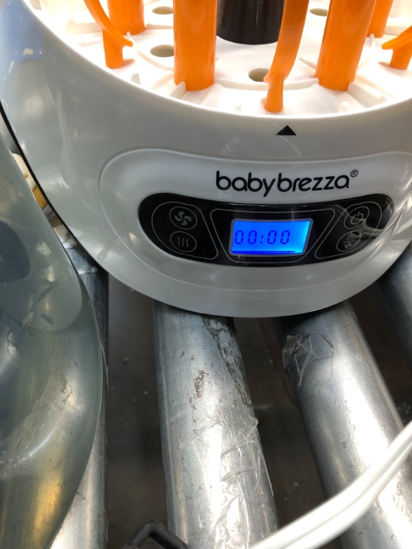 Photo 3 of Baby Brezza Baby Bottle Sterilizer and Dryer Machine – Electric Steam Sterilization - Universal Fit - Pacifiers, Glass, Plastic, and Newborn Feeding Bottles
