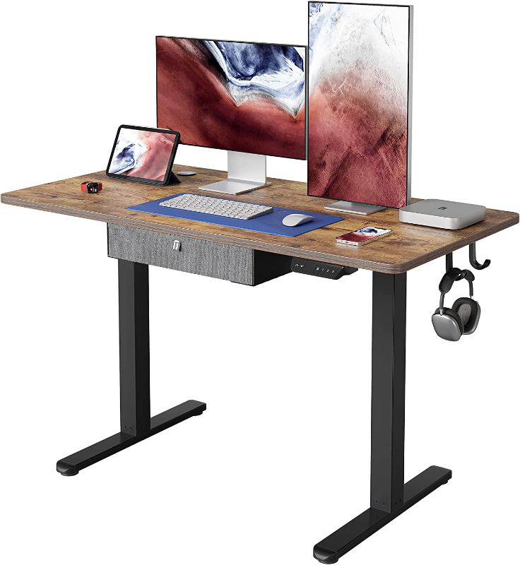 Photo 1 of 48 x 24 Inches FEZIBO Standing Desk with Drawer, Adjustable Height Electric Stand up Desk, Sit Stand Home Office Desk, Ergonomic Workstation Black Steel Frame/Rustic Brown Tabletop
