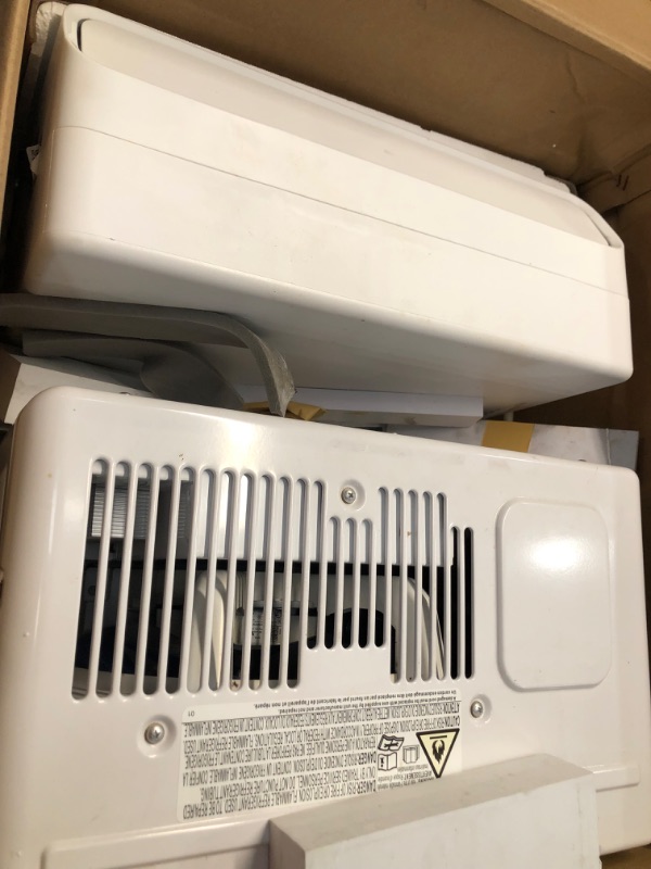 Photo 2 of Midea 12,000 BTU U-Shaped Smart Inverter Window Air Conditioner–Cools up to 550 Sq. Ft., Ultra Quiet with Open Window Flexibility, Works with Alexa/Google Assistant, 35% Energy Savings, Remote Control
