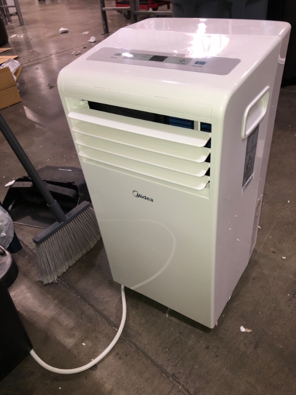 Photo 1 of Midea 8,000 BTU ASHRAE (5,300 BTU SACC) Portable Air Conditioner, Cools up to 175 Sq. Ft., Works as Dehumidifier & Fan, Remote Control & Window Kit Included
