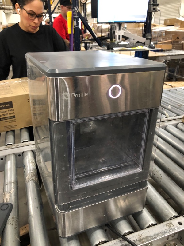 Photo 2 of ***PARTS ONLY*** GE Profile Opal | Countertop Nugget Ice Maker | Portable Ice Machine Complete with Bluetooth Connectivity | Smart Home Kitchen Essentials | Stainless Steel Finish | Up to 24 lbs. of Ice Per Day(POWERS ON. USED AND MINOR DENTS AND DAMAGE)