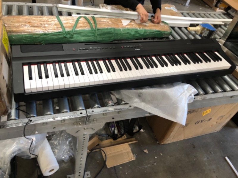 Photo 2 of YAMAHA P125 88-Key Weighted Action Digital Piano with Power Supply and Sustain Pedal, Black (POWERS ON BUT NONFUNCTIONAL. NEEDS REPAIR NO VISIBLE DAMAGE BUT ONLY MAKES NOISE)