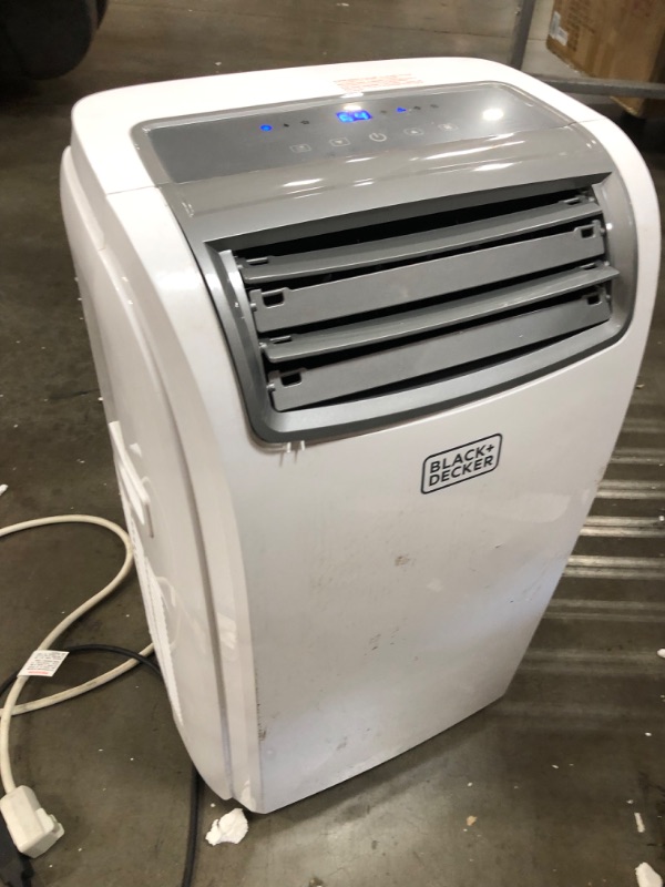 Photo 2 of ***PARTS ONLY*** BLACK+DECKER 8,000 BTU DOE (14,000 BTU ASHRAE) Portable Air Conditioner with Remote Control, White (USED. TESTED AND WORKS BUT DOESNT BLOW COLD. PLASTIC CRACKED IN A COUPLE SPOTS)