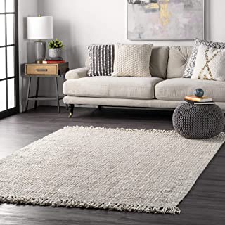 Photo 1 of 6X9 NATURAL WOVEN RUG WITH TASSELS