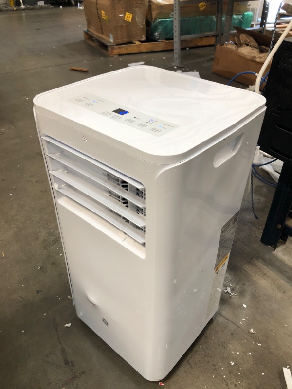 Photo 2 of GE 6,100 BTU Portable Air Conditioner for Small Rooms up to 250 sq ft., 3-in-1 with Dehumidify, Fan and Auto Evaporation, Included Window Installation Kit
