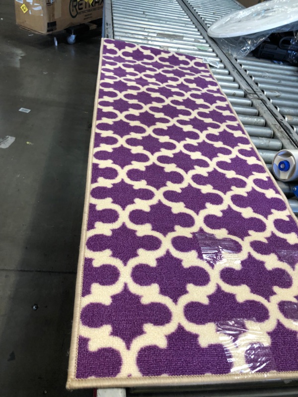 Photo 1 of 1FT 8IN X 3FT 10IN PURPLE AREA RUG