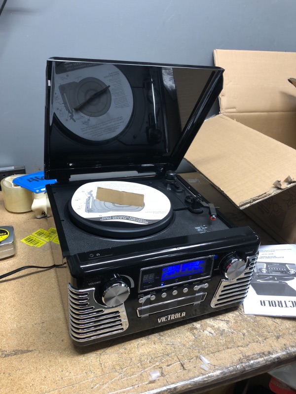 Photo 2 of COSMETIC DAMAGES***Victrola 50's Retro Bluetooth Record Player & Multimedia Center with Built-in Speakers - 3-Speed Turntable, CD Player, AM/FM Radio | Vinyl to MP3 Recording | Wireless Music Streaming | Black Black Record Player