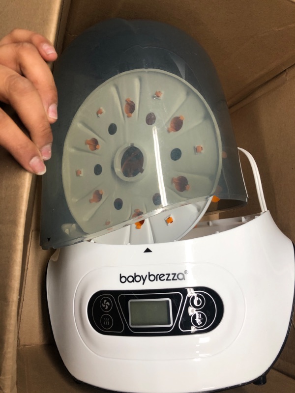 Photo 1 of Baby Brezza Baby Bottle Sterilizer and Dryer Machine – Electric Steam Sterilization - Universal Fit - Pacifiers, Glass, Plastic, and Newborn Feeding Bottles