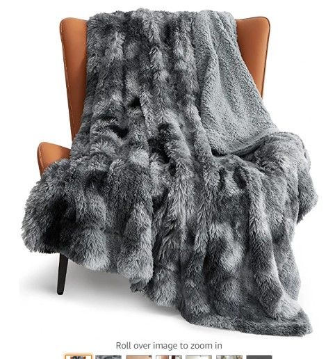 Photo 1 of 4.4 out of 5 stars2,501 Reviews
Premium Soft Throw Blankets, Fuzzy Bed Throw Blanket Sherpa Cozy and Warm, Fur Throw Blanket for Women& Man (40x50, Silver Grey Blanket)