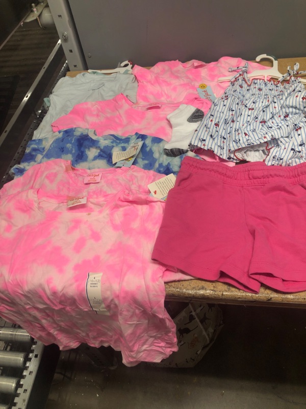 Photo 1 of GIRLS AND BABIES CLOTHING BUNDLE: 10 Pieces, Shirts Onesies Shorts Socks, Some Items Stained ***AS IS NO RETURNS***