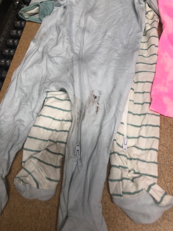 Photo 1 of GIRLS AND BABIES CLOTHING BUNDLE: 10 Pieces, Shirts Onesies Shorts Socks, Some Items Stained ***AS IS NO RETURNS***
