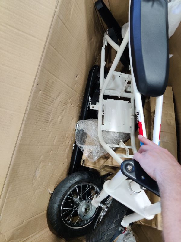 Photo 3 of parts only
Razor Rambler 12 – 24V Electric Minibike with Retro Style, Up to 14 mph, Wide 12" Air- Filled Tires, High-Torque 250-watt Motor, Up to 40 Minutes Ride Time, for Ages 13 and up

