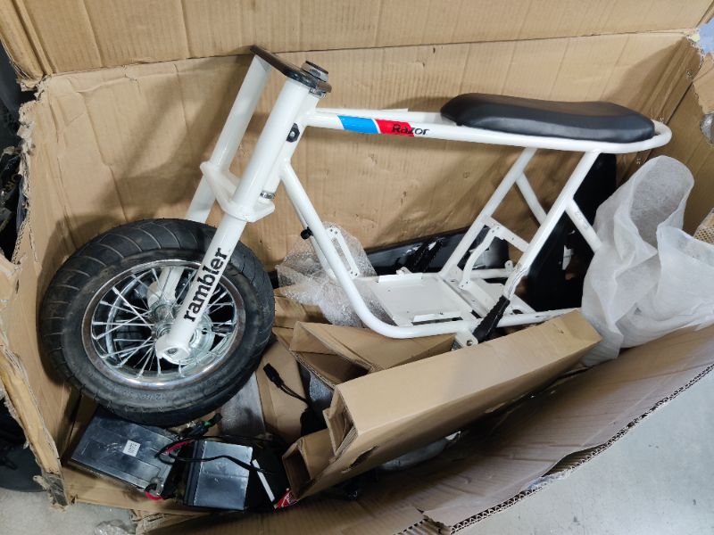 Photo 2 of parts only
Razor Rambler 12 – 24V Electric Minibike with Retro Style, Up to 14 mph, Wide 12" Air- Filled Tires, High-Torque 250-watt Motor, Up to 40 Minutes Ride Time, for Ages 13 and up
