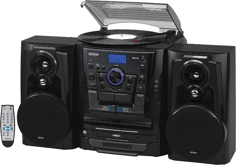 Photo 1 of JENSEN® Bluetooth® 3 Speed Stereo Turntable 3 CD Changer Music System with Dual Cassette Deck, Pitch Control and Remote Control
