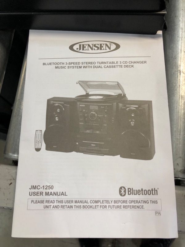 Photo 8 of JENSEN® Bluetooth® 3 Speed Stereo Turntable 3 CD Changer Music System with Dual Cassette Deck, Pitch Control and Remote Control
